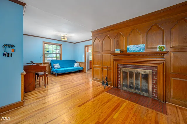 a kitchen with stainless steel appliances granite countertop a stove and a refrigerator