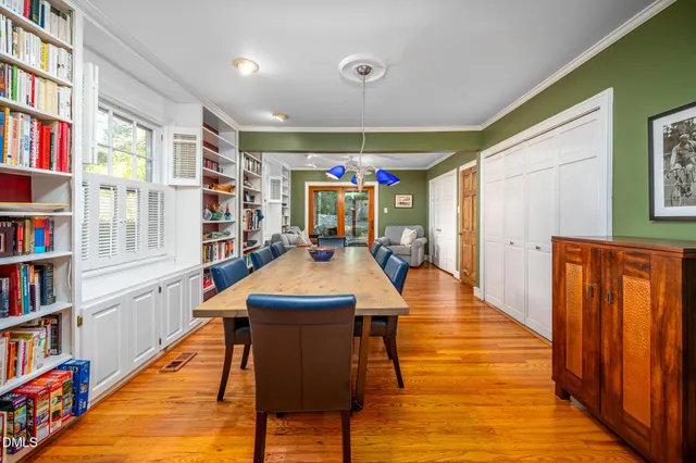 a bathroom with a toilet and a shower curtain