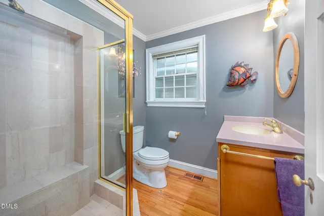 a view of a hallway with a window