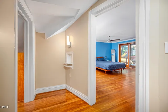a view of a chairs and table in the backyard