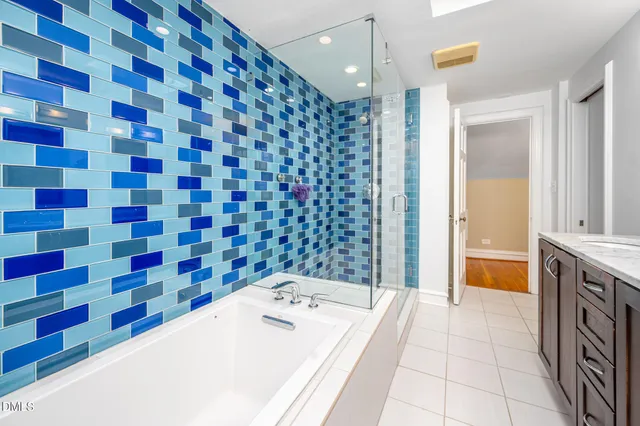 a view of a yard with plants and trees