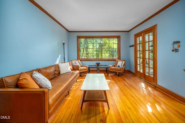 a large kitchen with stainless steel appliances granite countertop a stove a sink and a refrigerator