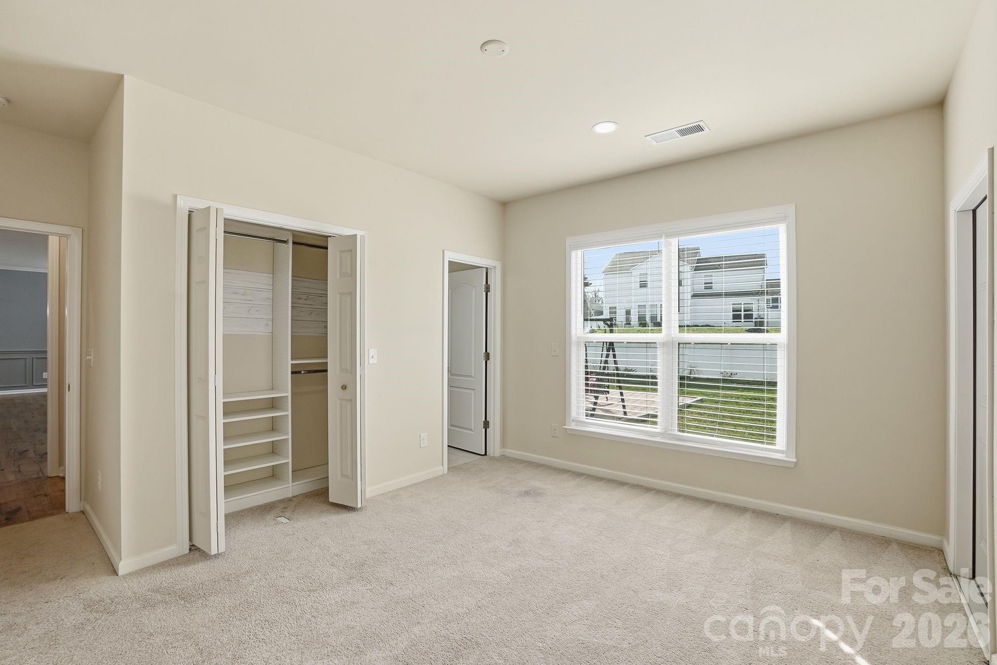 4029 Spring Garden Street Fort Mill, SC 29715 - Photo 20 of 48 a view of an empty room with a window