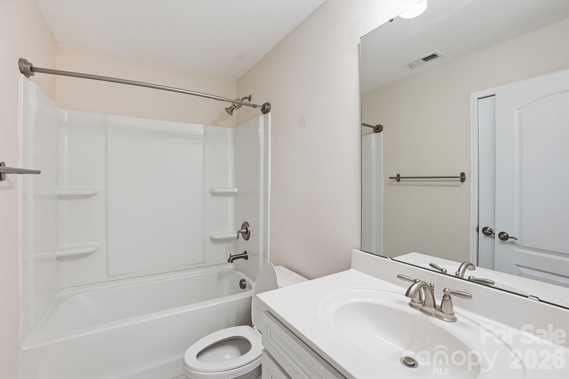 4029 Spring Garden Street Fort Mill, SC 29715 - Photo 27 of 48 a bathroom with a sink toilet and shower