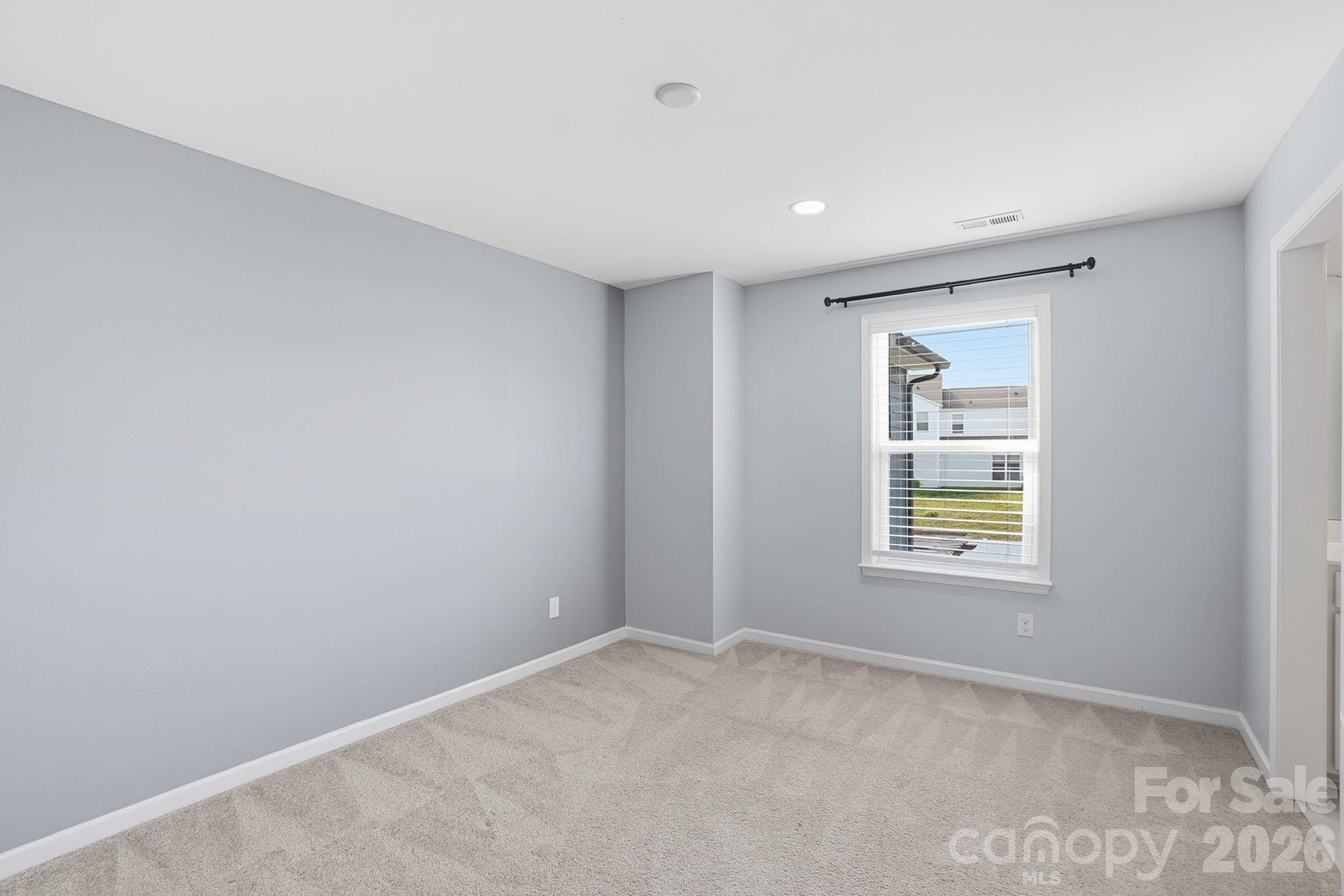 4029 Spring Garden Street Fort Mill, SC 29715 - Photo 29 of 48 a view of an empty room with a window
