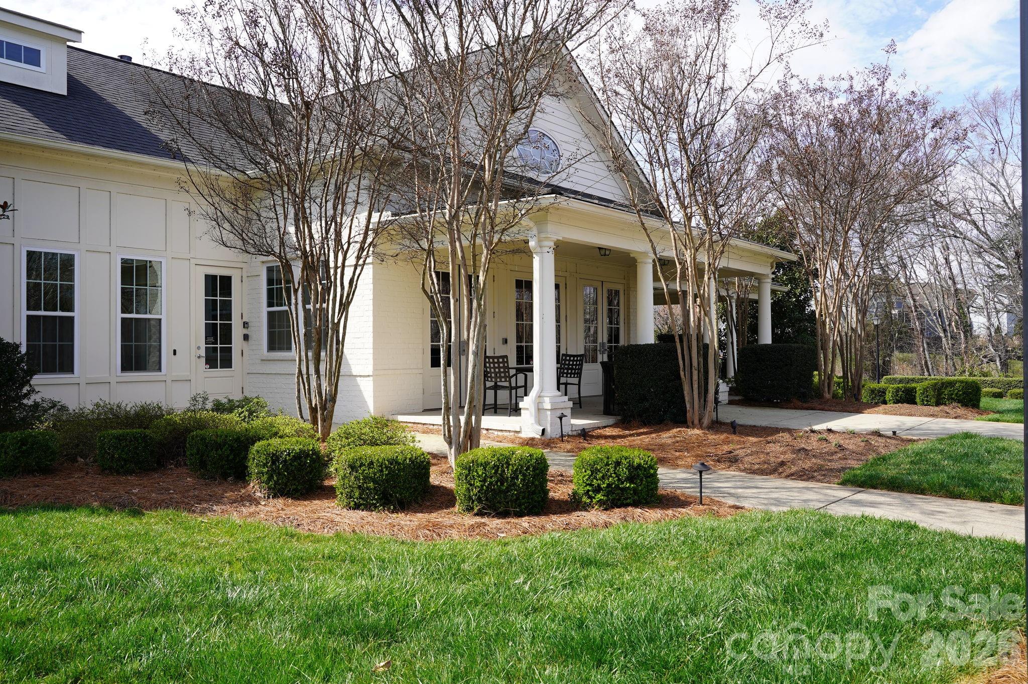 4029 Spring Garden Street Fort Mill, SC 29715 - Photo 46 of 48 a front view of a house with garden