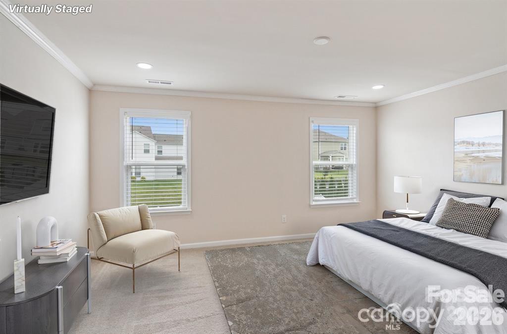 4029 Spring Garden Street Fort Mill, SC 29715 - Photo 8 of 48 a bedroom with a bed and a couch