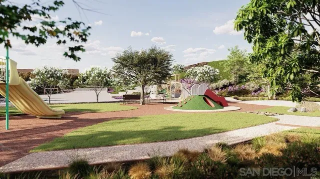 a view of a playground with basketball court