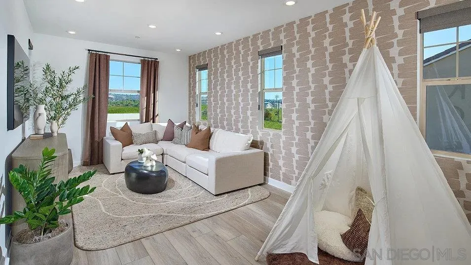 5556 Alethea Way Oceanside, CA 92057 - Photo 9 of 26 a living room with furniture and a large window