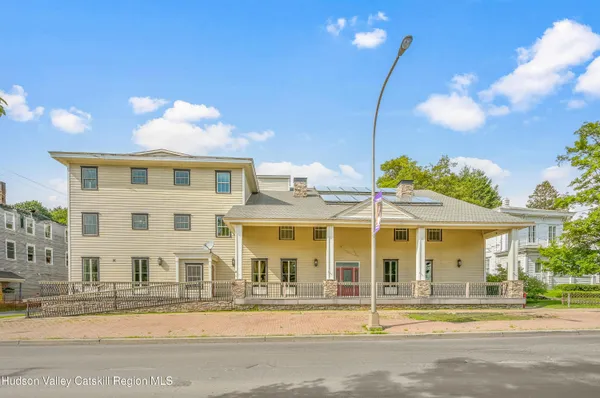 a view of a house with a swimming pool