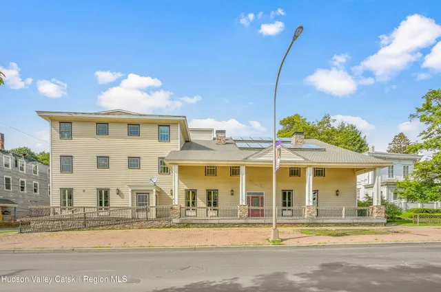a view of a house with a swimming pool