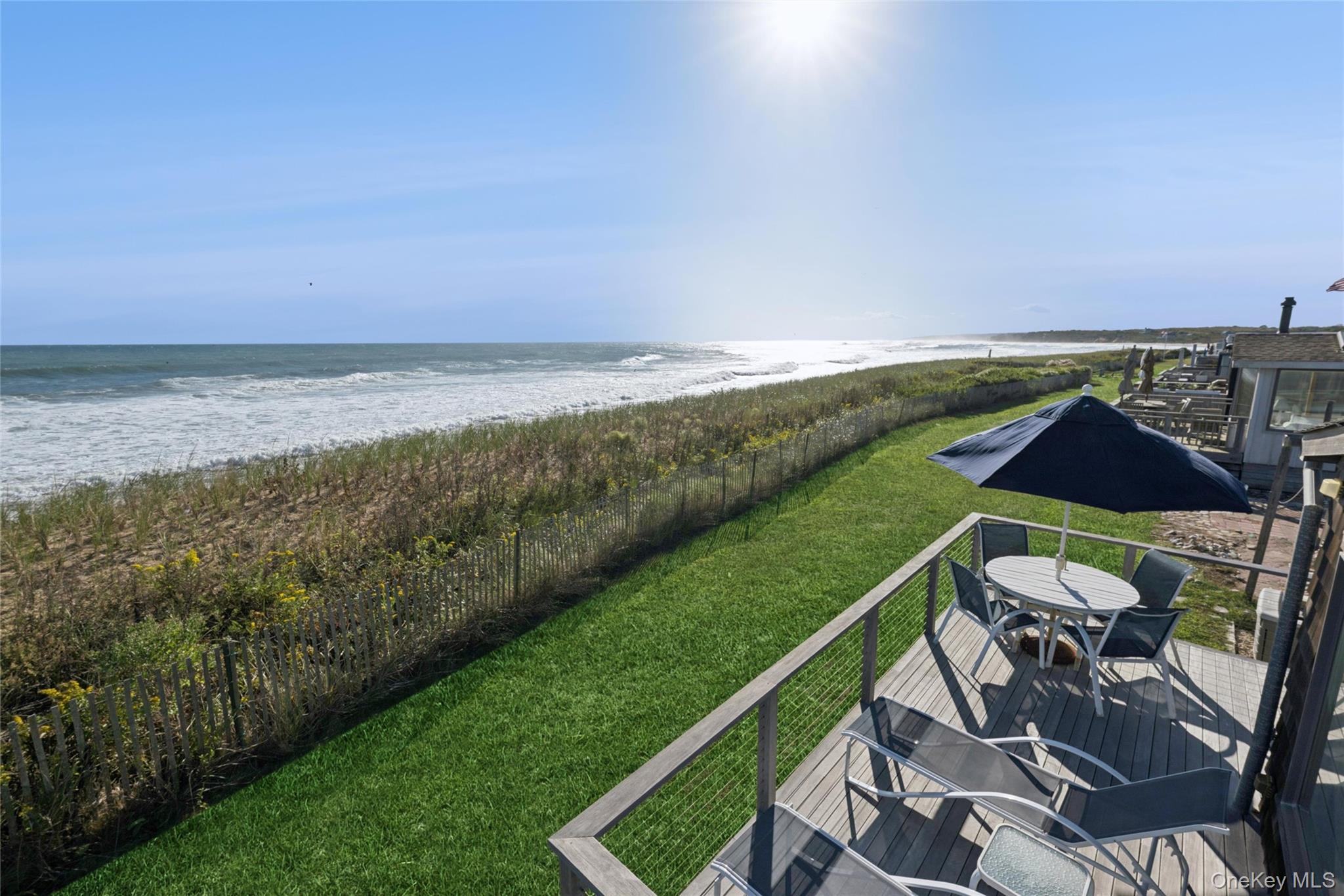 100 Deforest Road, Unit 25 Montauk, NY 11954 - Photo 12 of 21 a view of a balcony with yard