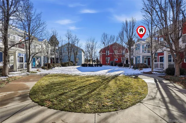a view of swimming pool with a bench in front of it
