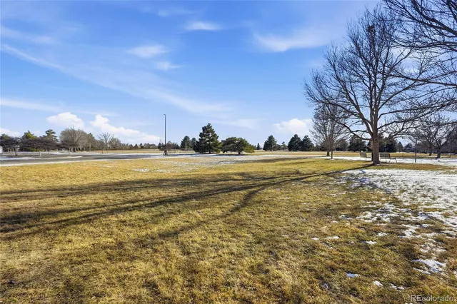 a view of a lake with a building in the background