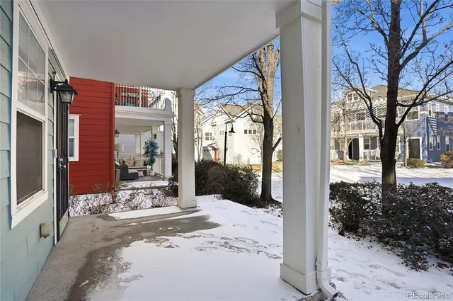 a view of a house with a yard and balcony