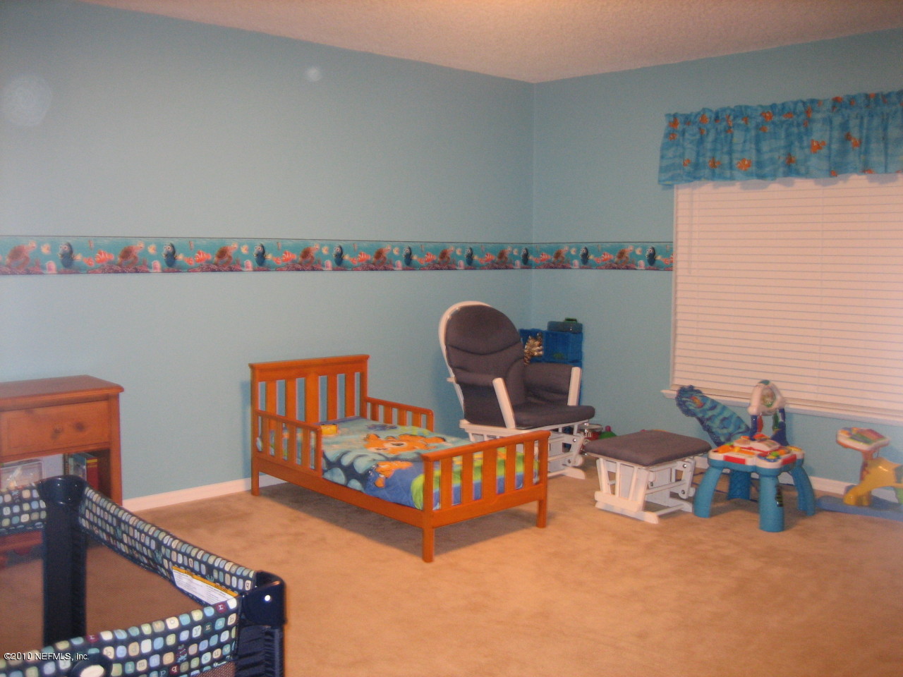 3411 Hickory Hammock Road Jacksonville, FL 32226 - Photo 12 of 14 a bed room with furniture and a table