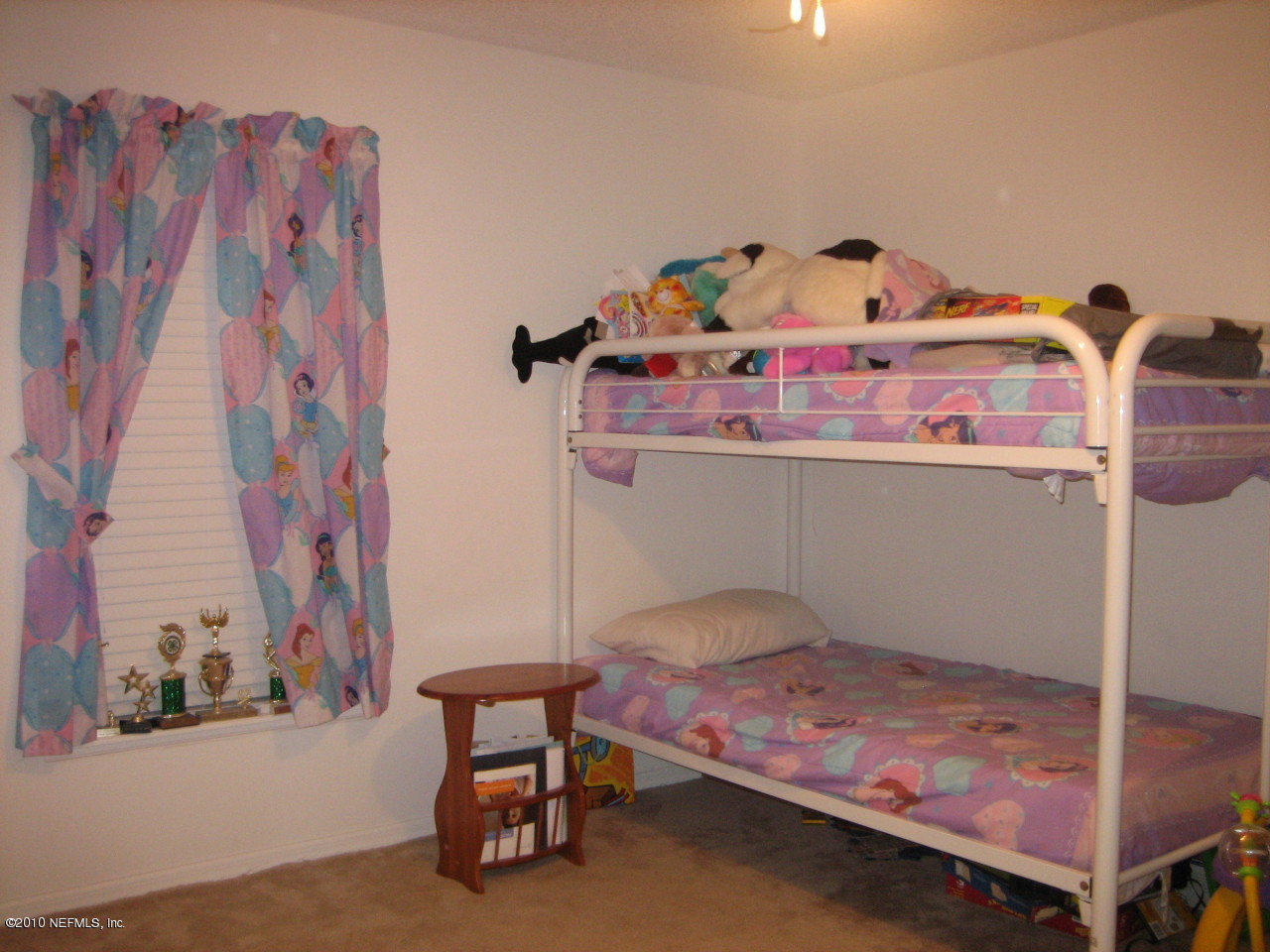 3411 Hickory Hammock Road Jacksonville, FL 32226 - Photo 13 of 14 a bedroom with a bed and a table