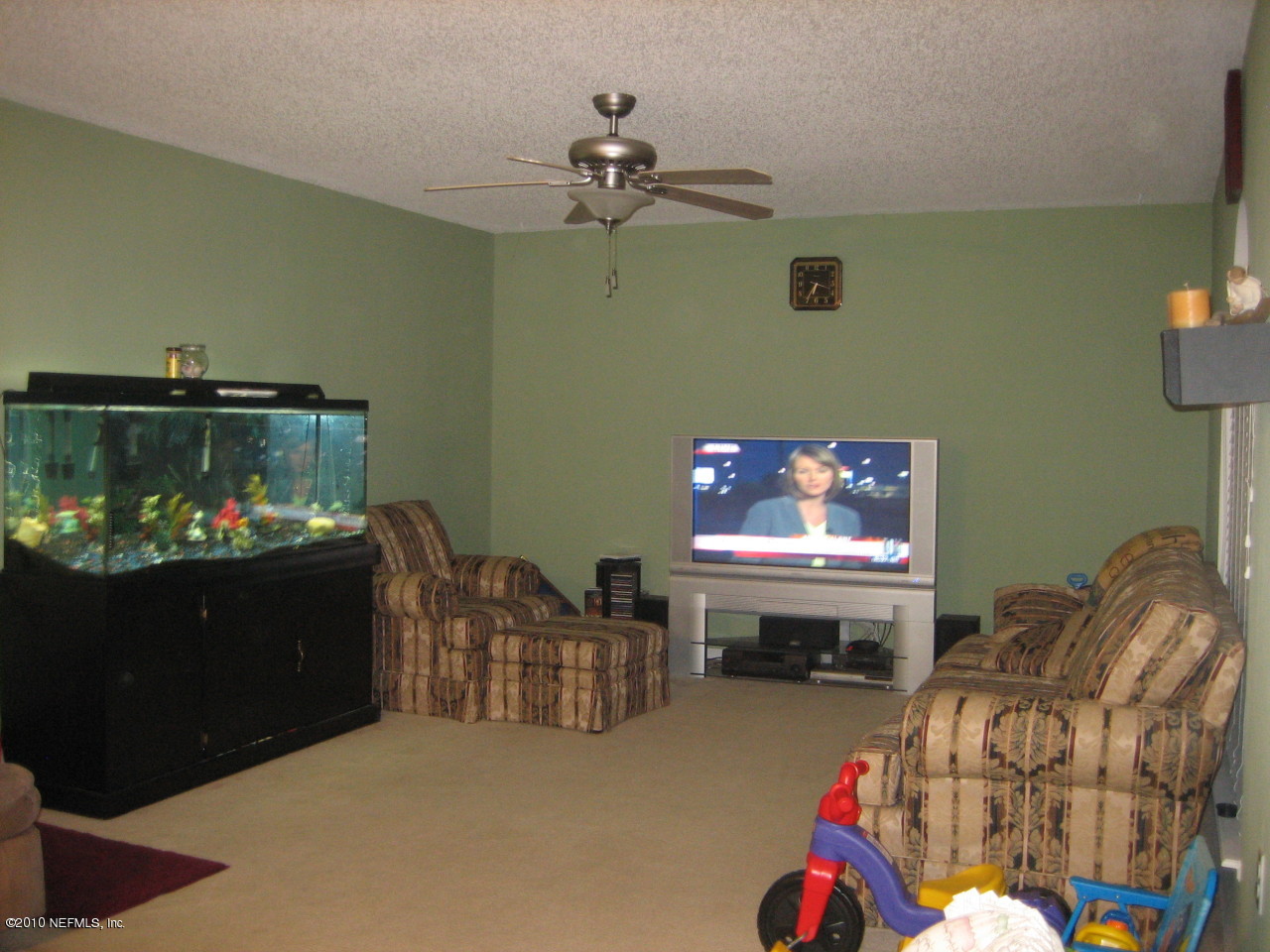 3411 Hickory Hammock Road Jacksonville, FL 32226 - Photo 6 of 14 a living room with furniture and a fireplace