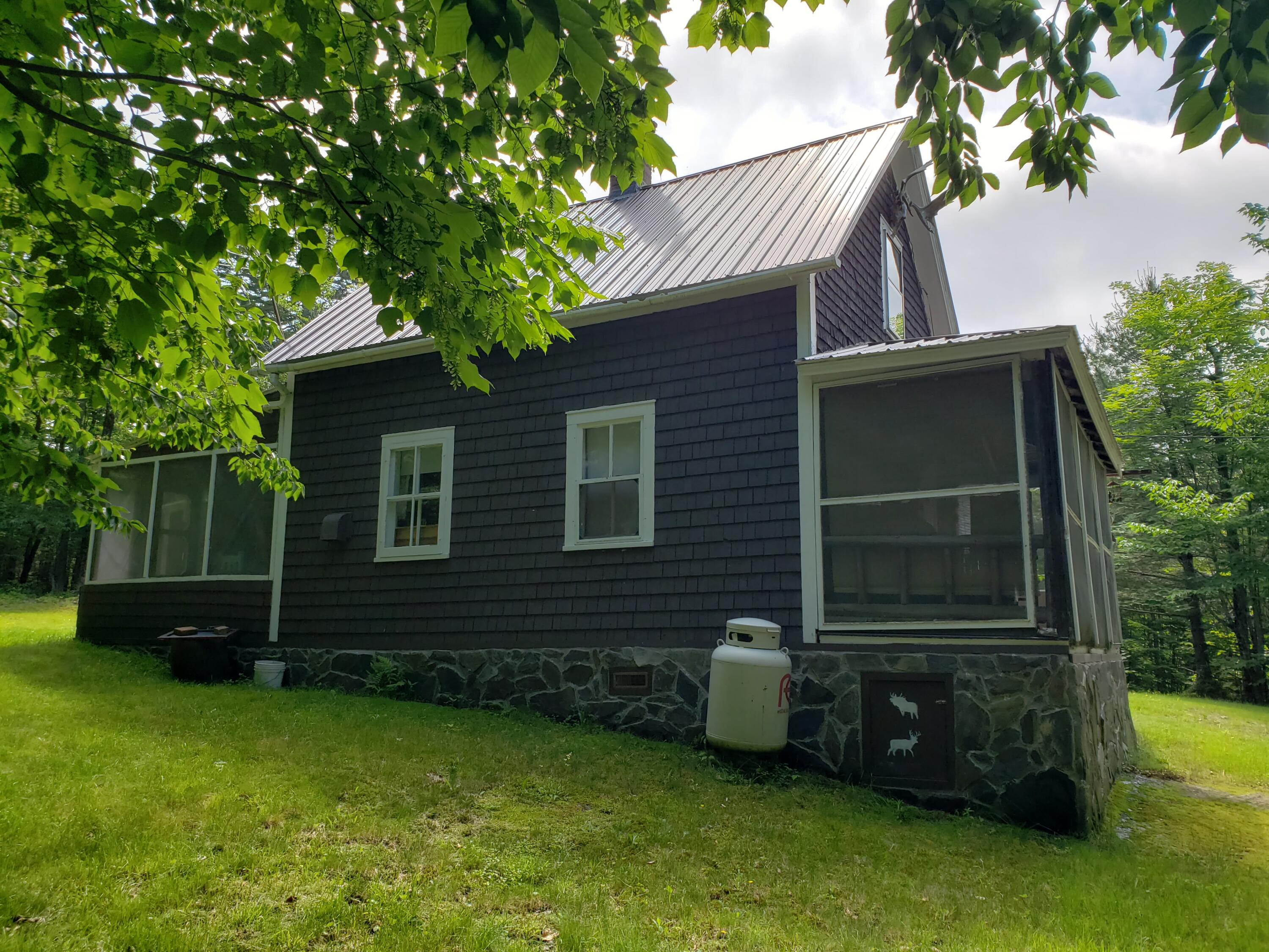 224 E Road Greenville, ME 04441 - Photo 5 of 30 Left Side Camp