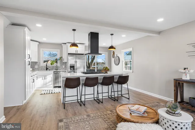 a view of kitchen with dining table and chairs