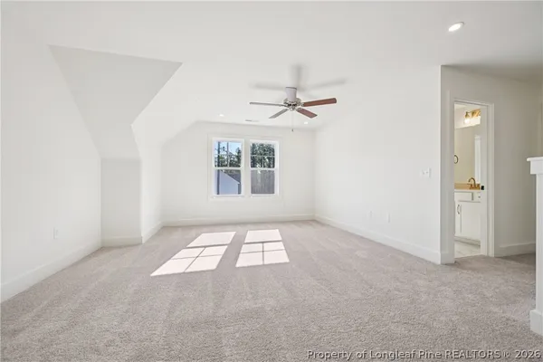 a view of a wooden deck and lake