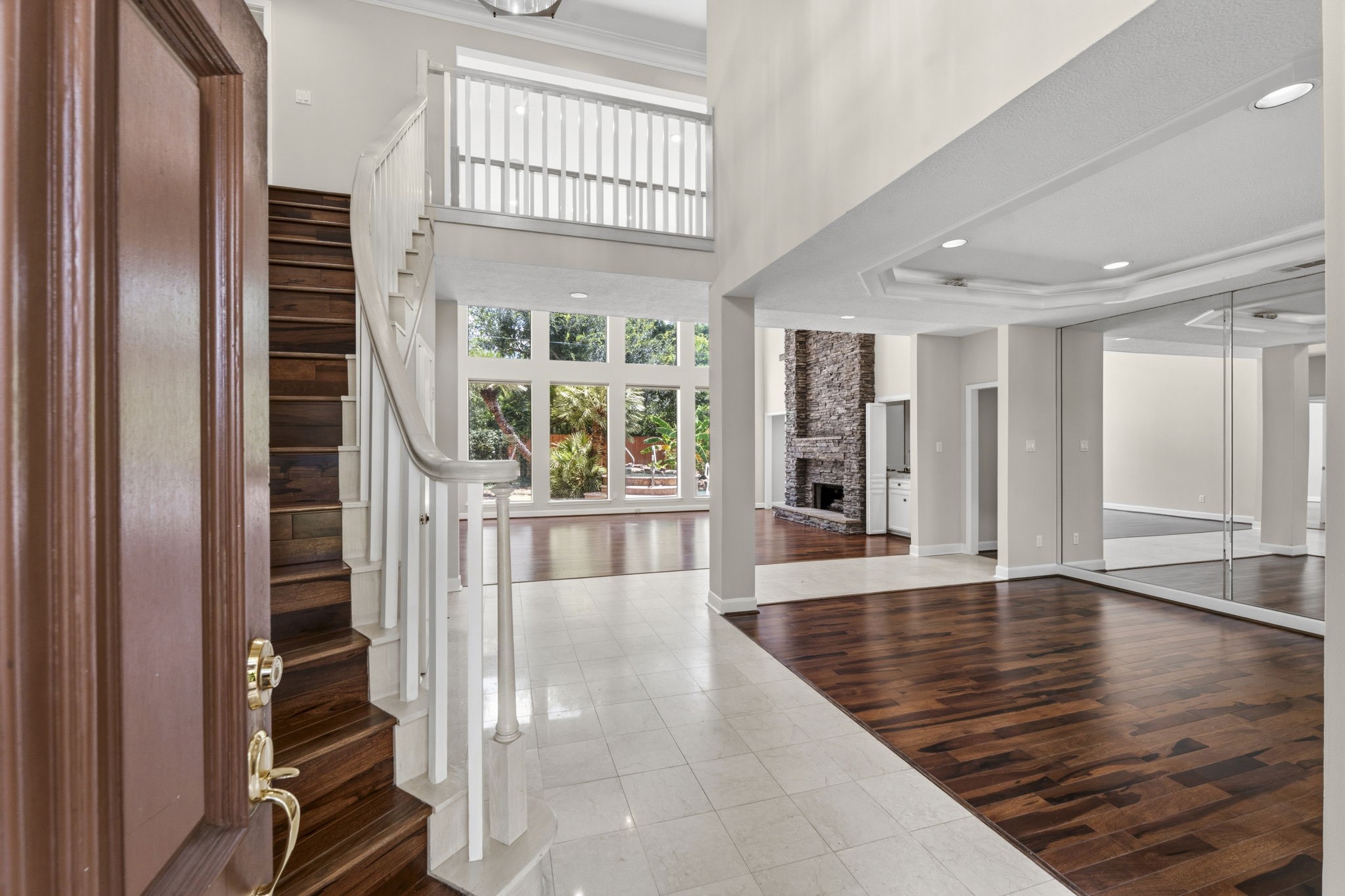 18503 Cabaniss Circle Spring, TX 77379 - Photo 8 of 49 The moment you enter, soaring 18' ceilings and open sightlines showcase the spacious design and timeless elegance found throughout the home.