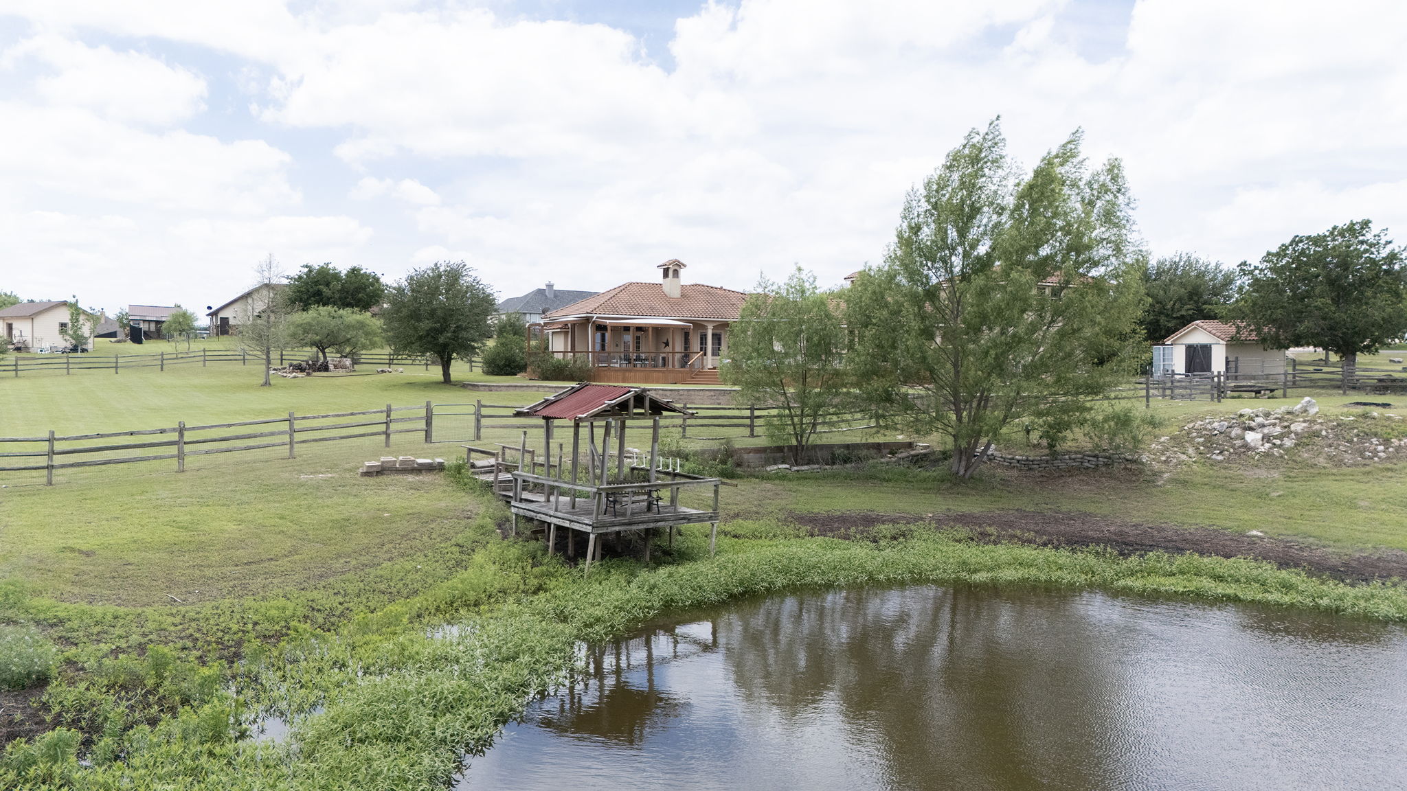 17308 St Therese Road Manor, TX 78653 - Photo 36 of 40 a view of a lake with a large mountain