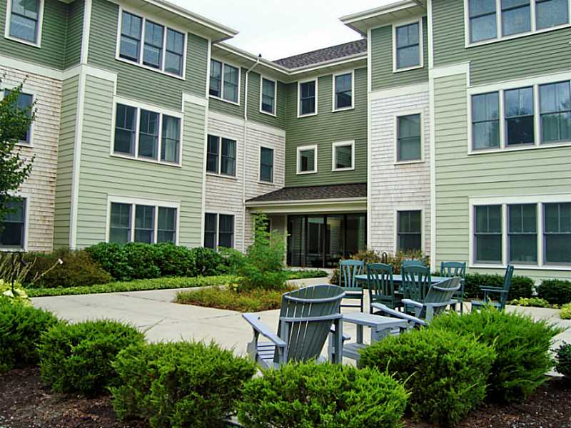 200 Clarke Road, Unit 108 Narragansett, RI 02882 - Photo 9 of 9 Yard/Garden. Lovely common patio with comfortable seating and grill