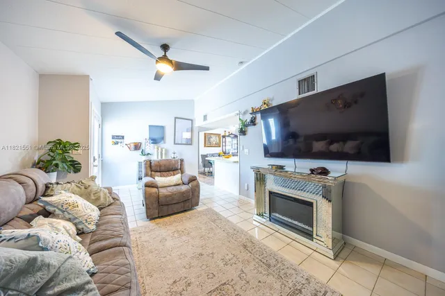 a kitchen with stainless steel appliances a stove a microwave and cabinets