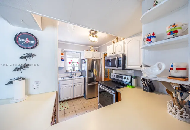 a bed room with a bed and a dresser