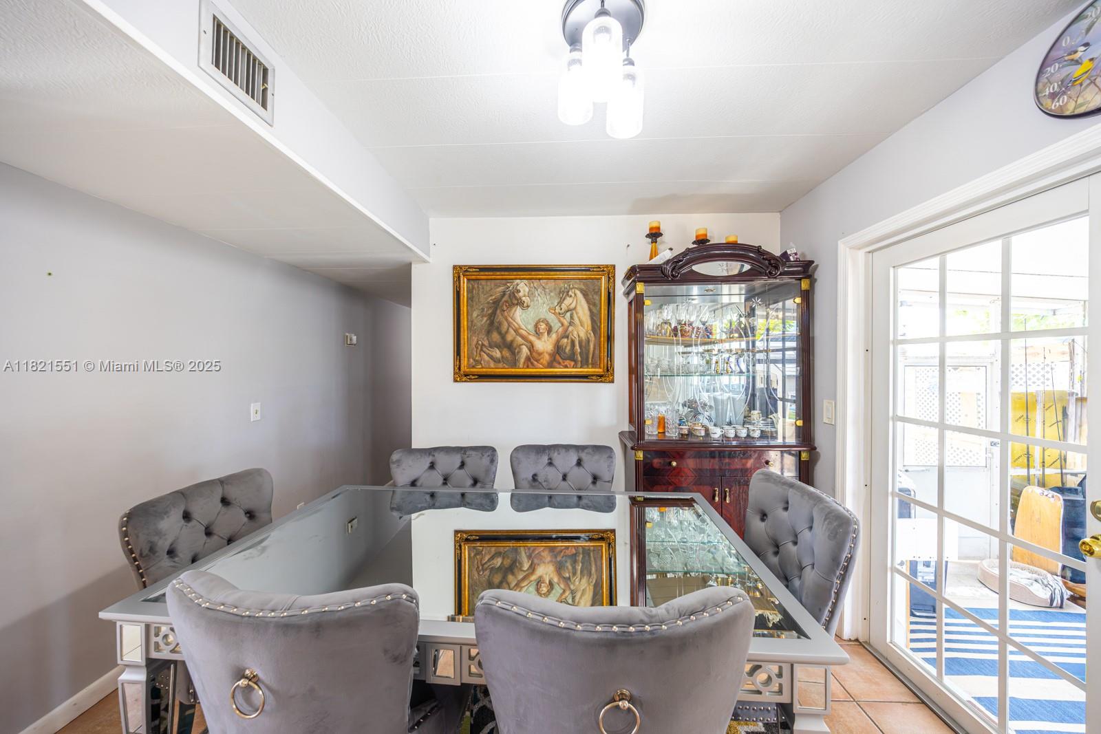 780 95th Street Marathon, FL 33050 - Photo 15 of 31 a living room with furniture and a large window