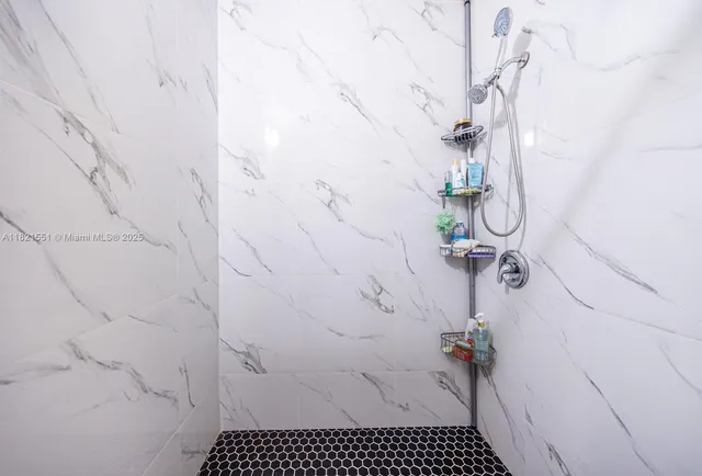 a bathroom with a sink a toilet and a bathtub