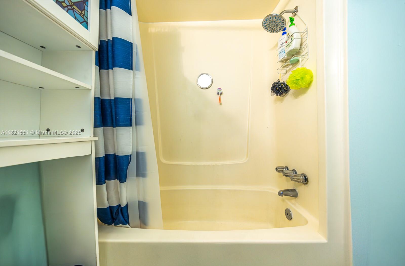 780 95th Street Marathon, FL 33050 - Photo 22 of 31 a bathroom with a bathtub and shower