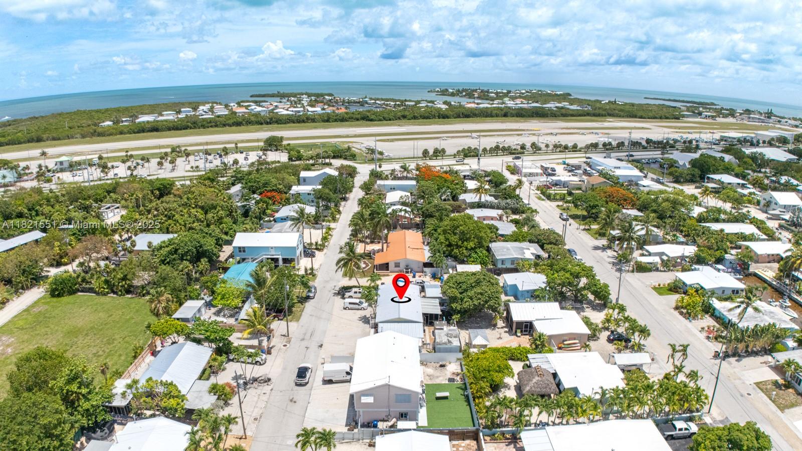 780 95th Street Marathon, FL 33050 - Photo 5 of 31 a city view with tall buildings