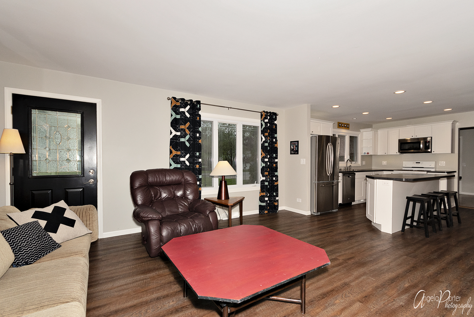 13 Johnathan Road Lake Zurich, IL 60047 - Photo 14 of 27 a living room with furniture a dining table with wooden floor