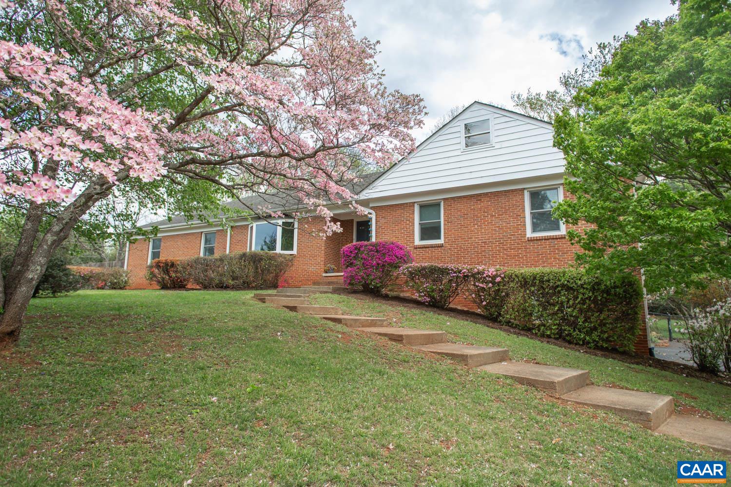 2750 Meriwether Drive Charlottesville, VA 22901 - Photo 1 of 52 a front view of a house with garden