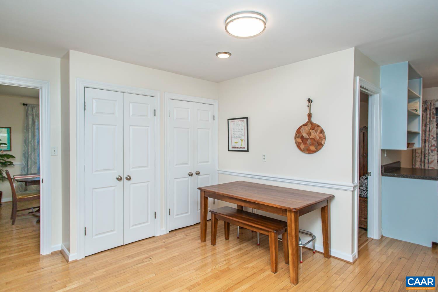 2750 Meriwether Drive Charlottesville, VA 22901 - Photo 16 of 52 a living room with furniture and a wooden floor