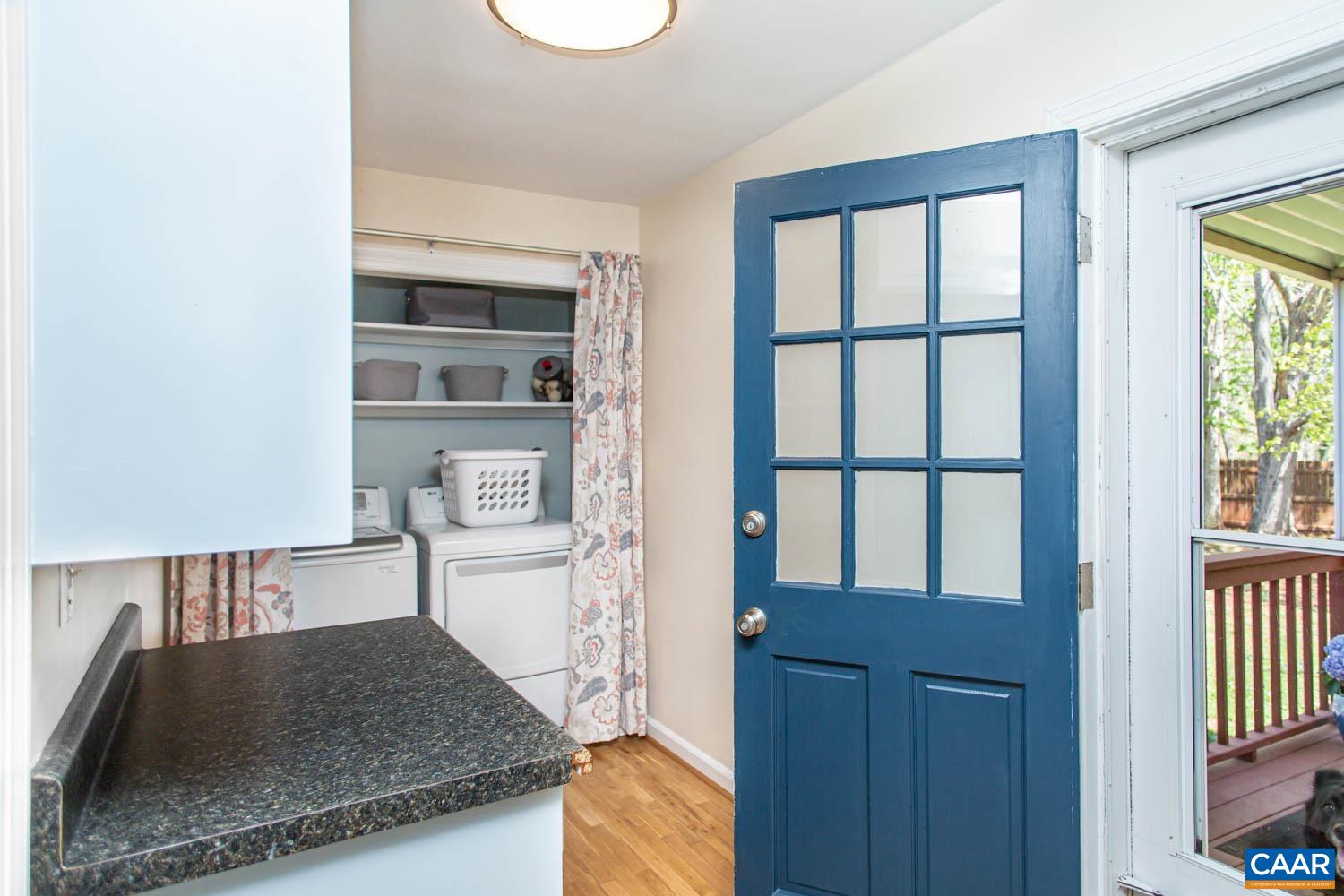 2750 Meriwether Drive Charlottesville, VA 22901 - Photo 18 of 52 a kitchen with a stove and a white refrigerator