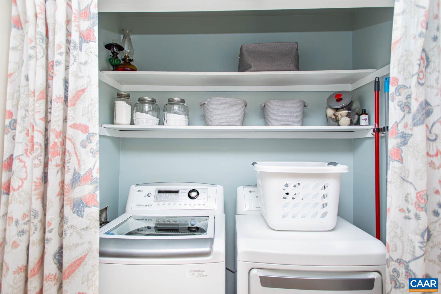 2750 Meriwether Drive Charlottesville, VA 22901 - Photo 19 of 52 a white stove top oven sitting inside of a kitchen