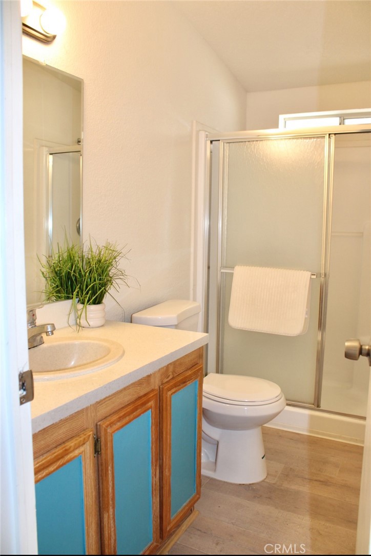 999 South Santa Fe Avenue, Unit 17 San Jacinto, CA 92583 - Photo 6 of 7 a bathroom with a sink toilet and shower