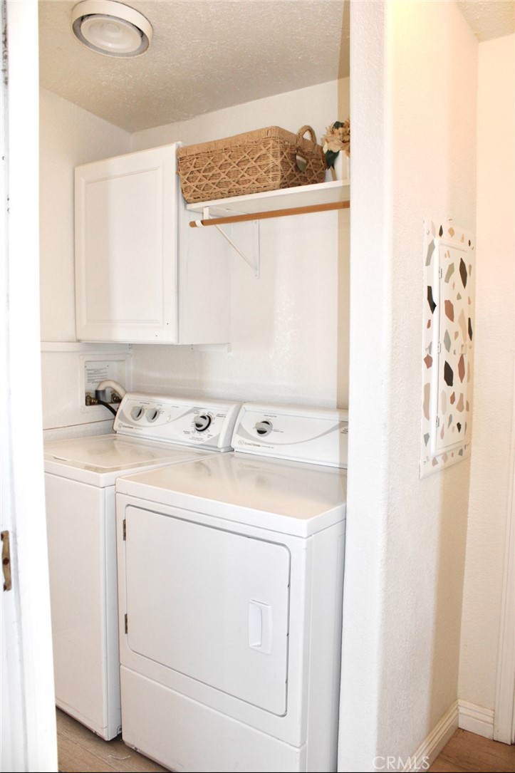 999 South Santa Fe Avenue, Unit 17 San Jacinto, CA 92583 - Photo 7 of 7 a utility room with dryer and washer