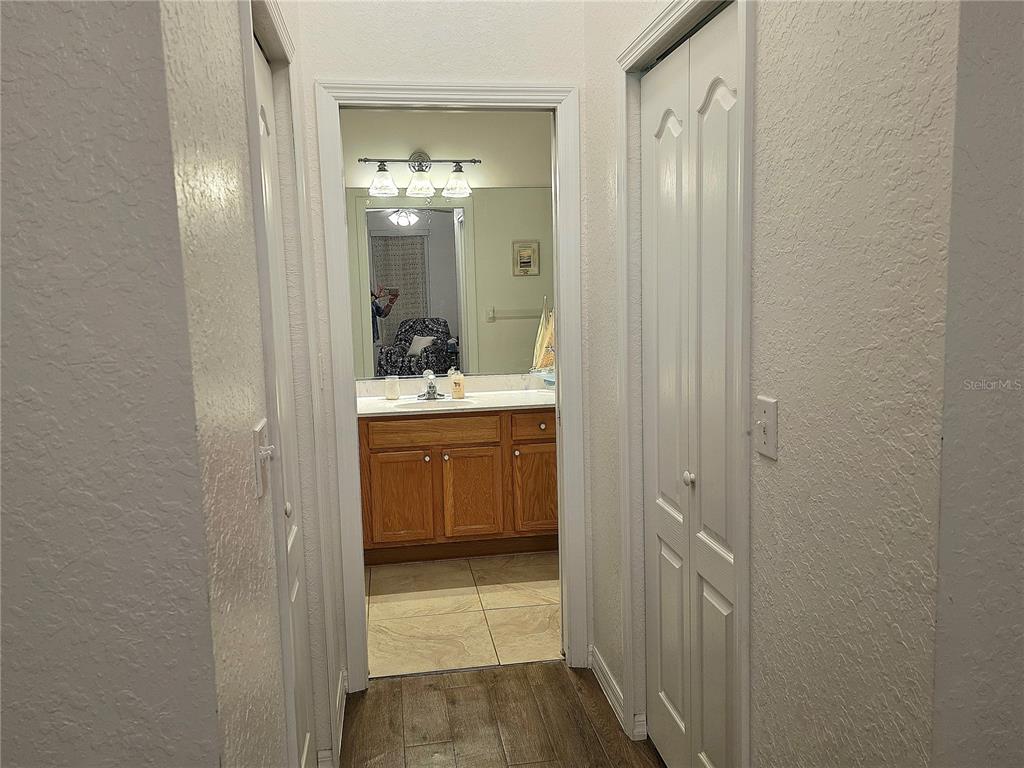 2116 Northeast 40th Terrace Ocala, FL 34470 - Photo 20 of 37 a bathroom with a sink a toilet and shower