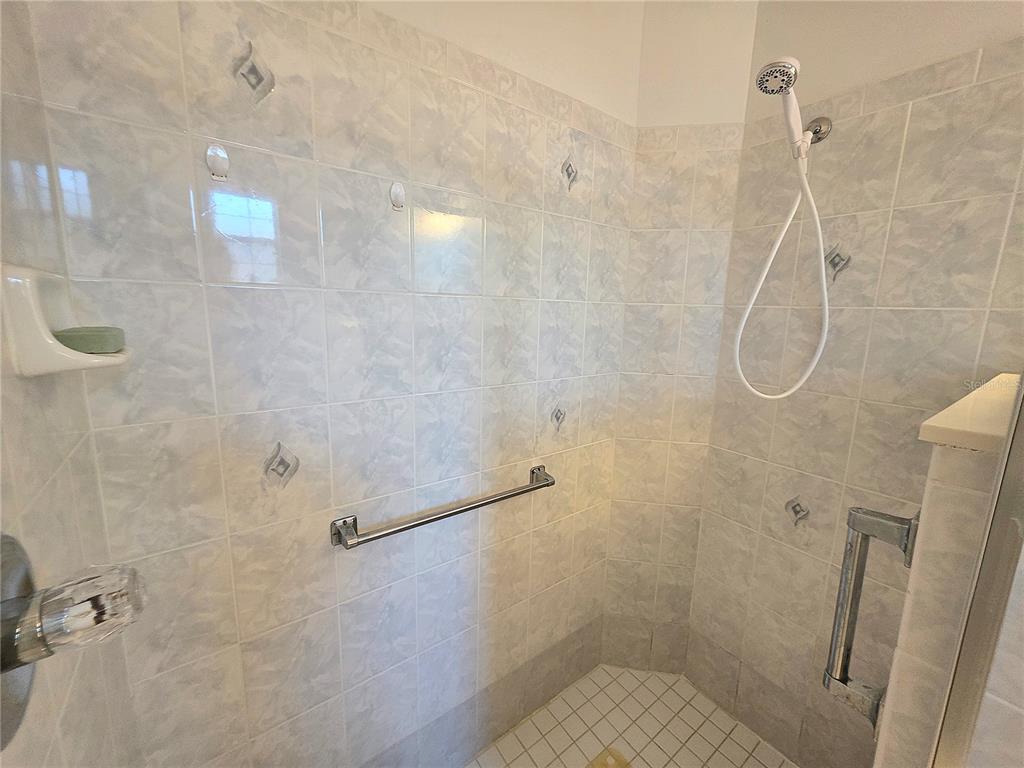 2116 Northeast 40th Terrace Ocala, FL 34470 - Photo 23 of 37 a bathroom with a shower
