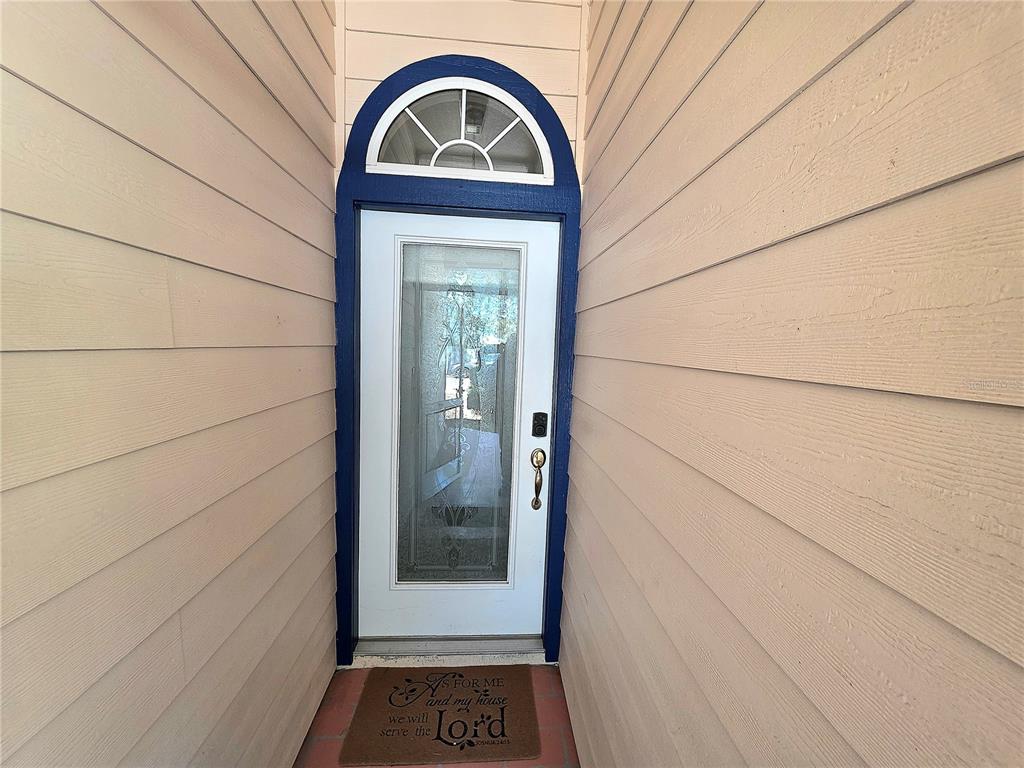 2116 Northeast 40th Terrace Ocala, FL 34470 - Photo 32 of 37 a view of front door of a house