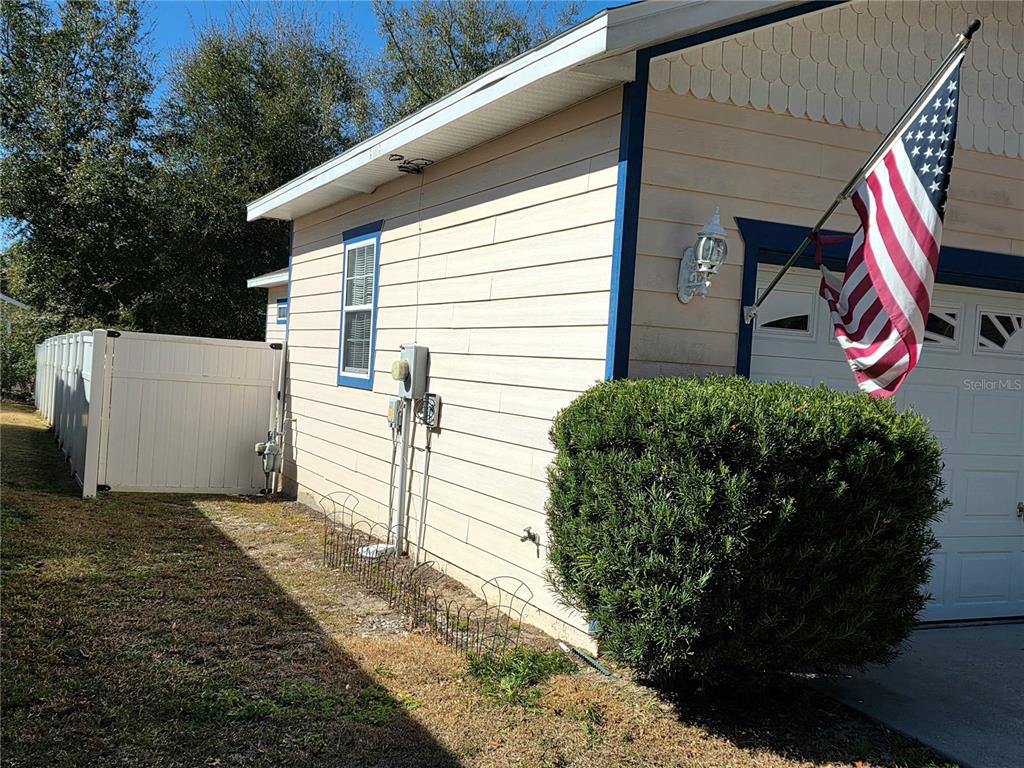 2116 Northeast 40th Terrace Ocala, FL 34470 - Photo 33 of 37 a view of a house with backyard and trees