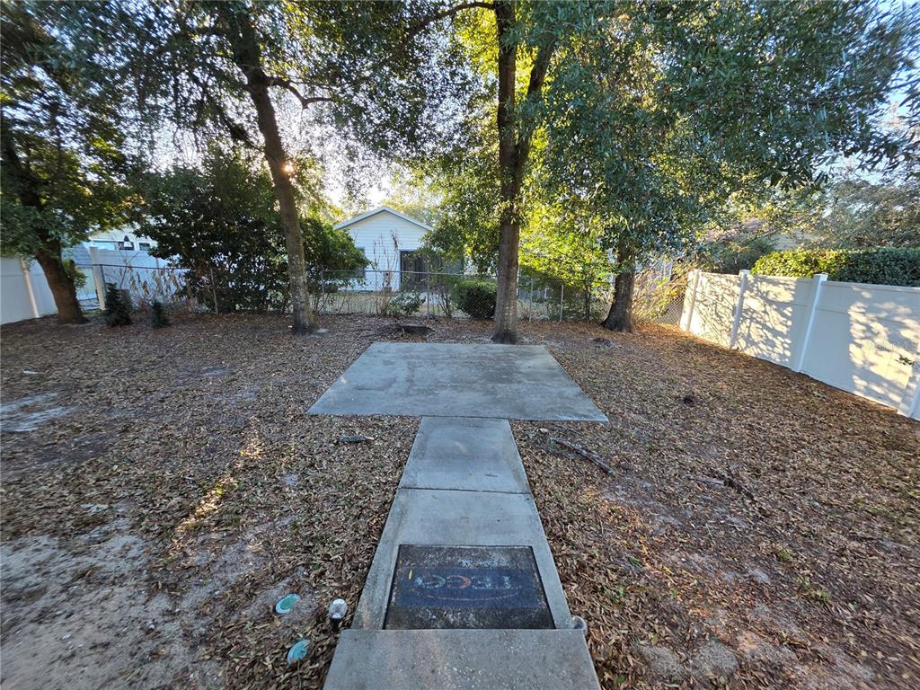 2116 Northeast 40th Terrace Ocala, FL 34470 - Photo 34 of 37 a view of a pathway with a yard