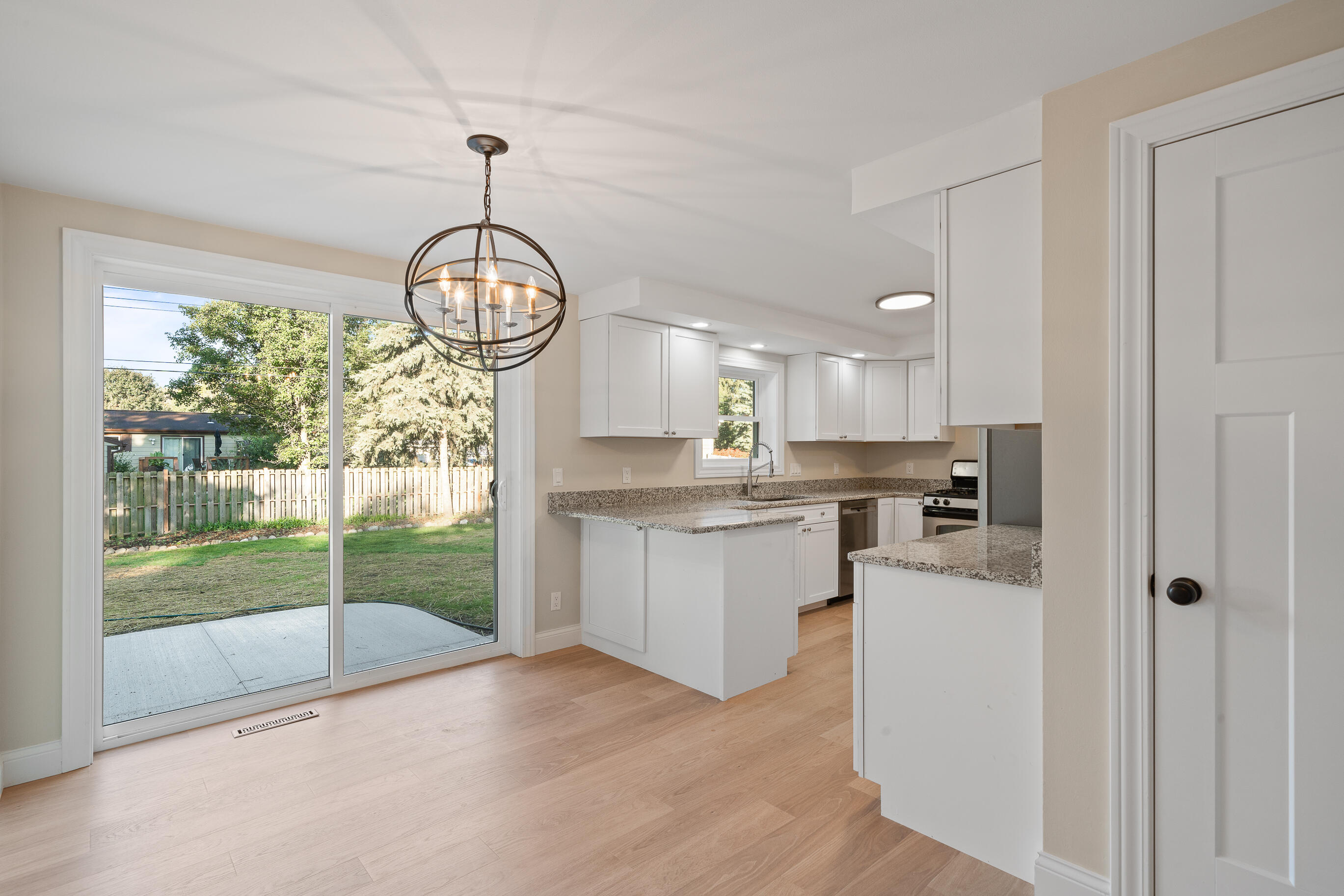 1018 Bonnie Brae Lane Lake Geneva, WI 53147 - Photo 8 of 64 Dining with slider