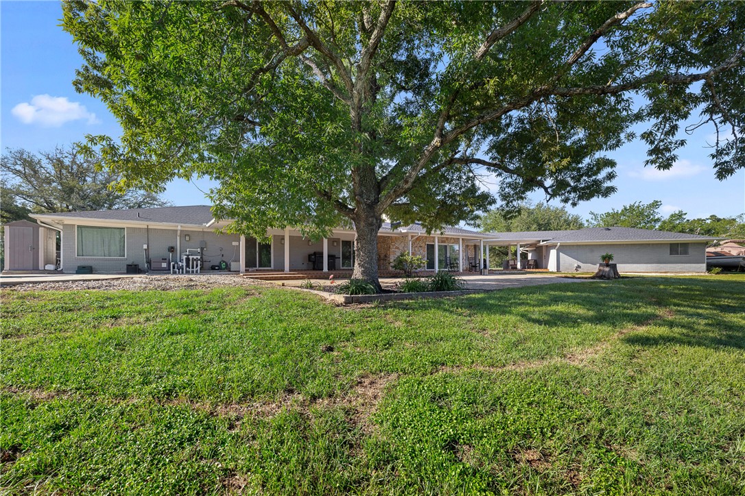 871 Cazey Loop Franklin, TX 77856 - Photo 41 of 42 a front view of a house with garden