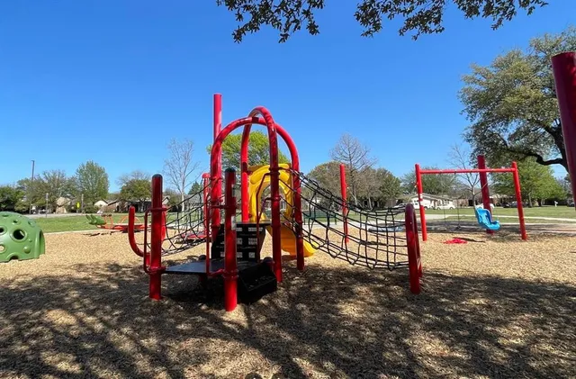 a living room with furniture fireplace and flat screen tv