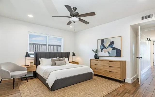 a view of a house with swimming pool and yard with furniture